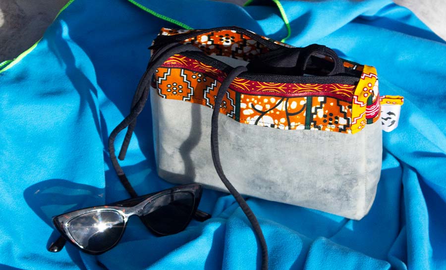 &Proud Bikini Bag Collaboration Bukawa Swim. Recycled plastic, African Wax Cotton