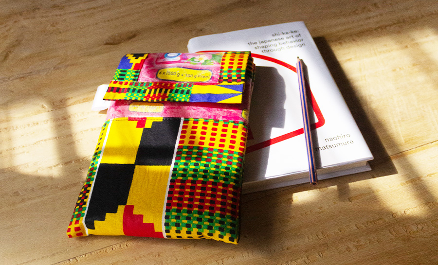 &Proud Book Pouch Collaboration Le Petit Librairie. Recycled plastic, African Wax Cotton