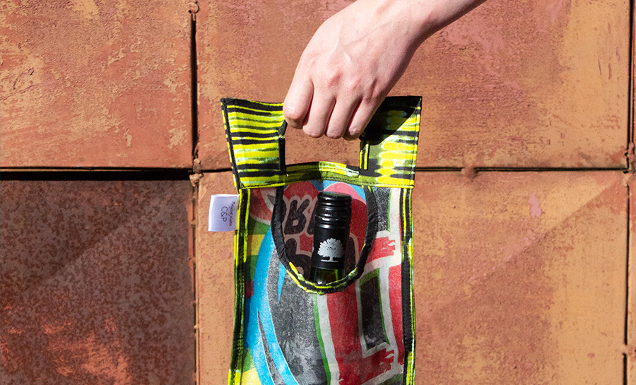 &Proud Wine Tote Collaboration with Kaza Kitchen. Recycled plastic.